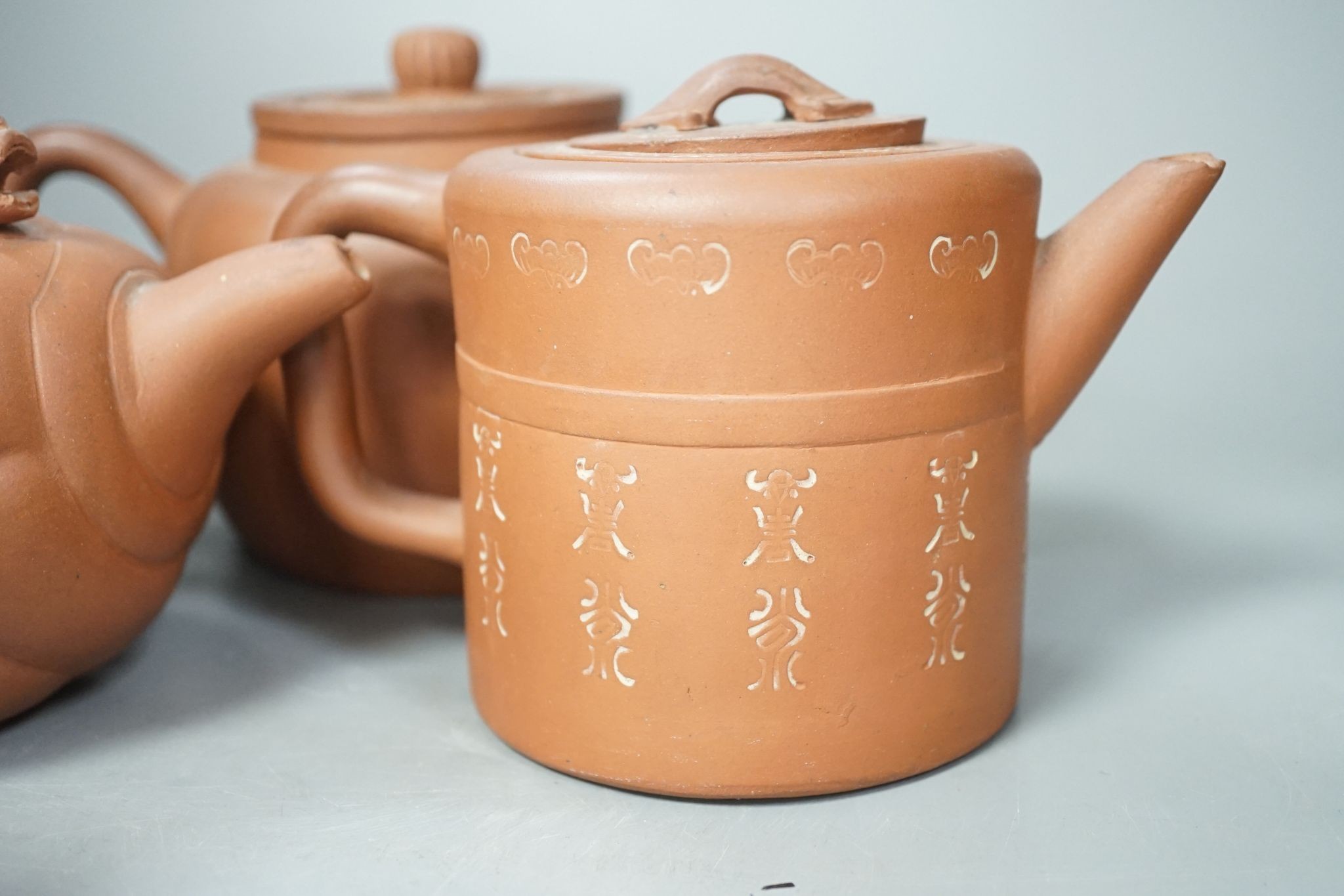 Six Chinese Yixing teapots, tallest 11cm